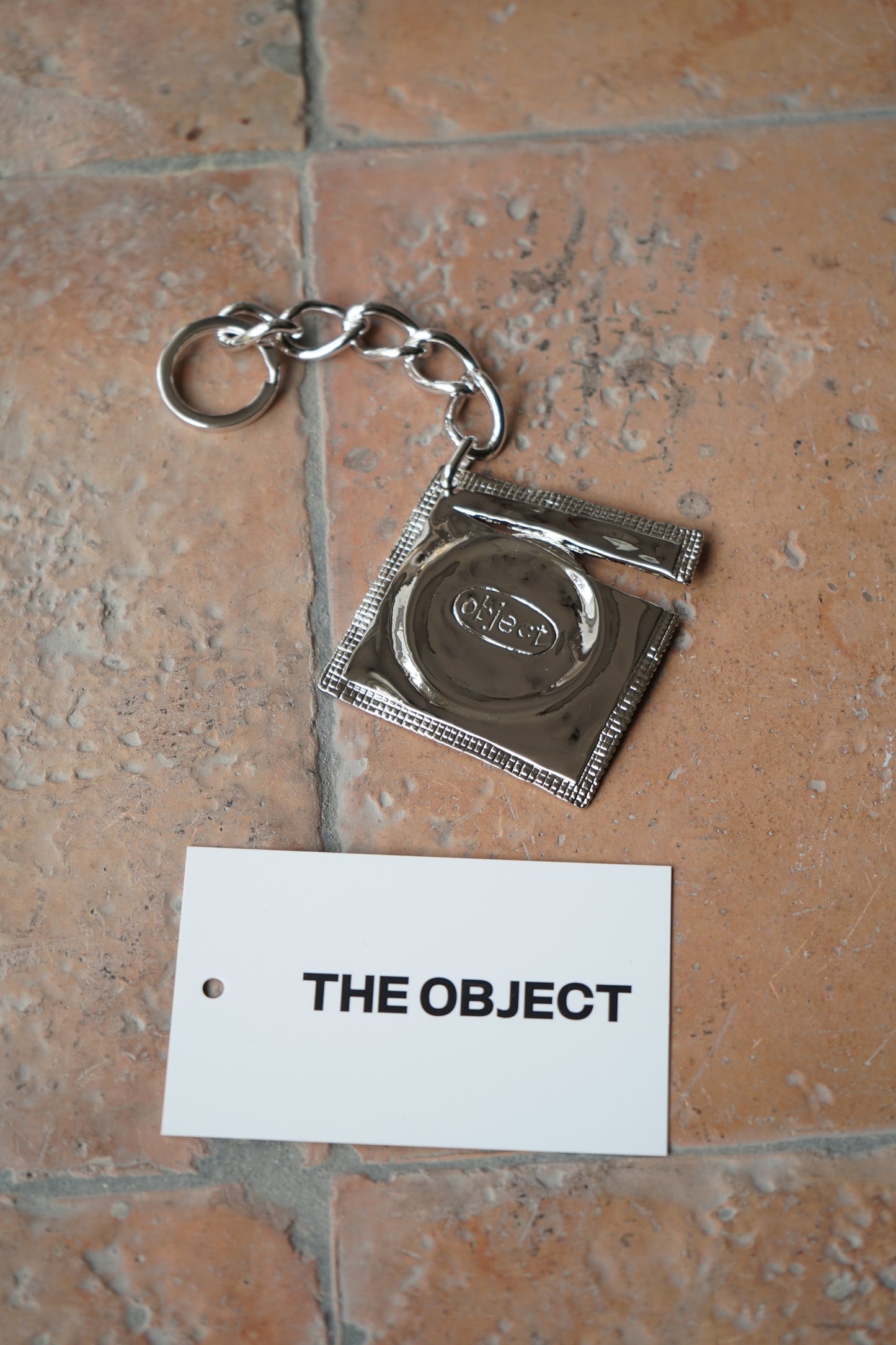 THE OBJECT Ripped Raincoat Keyring