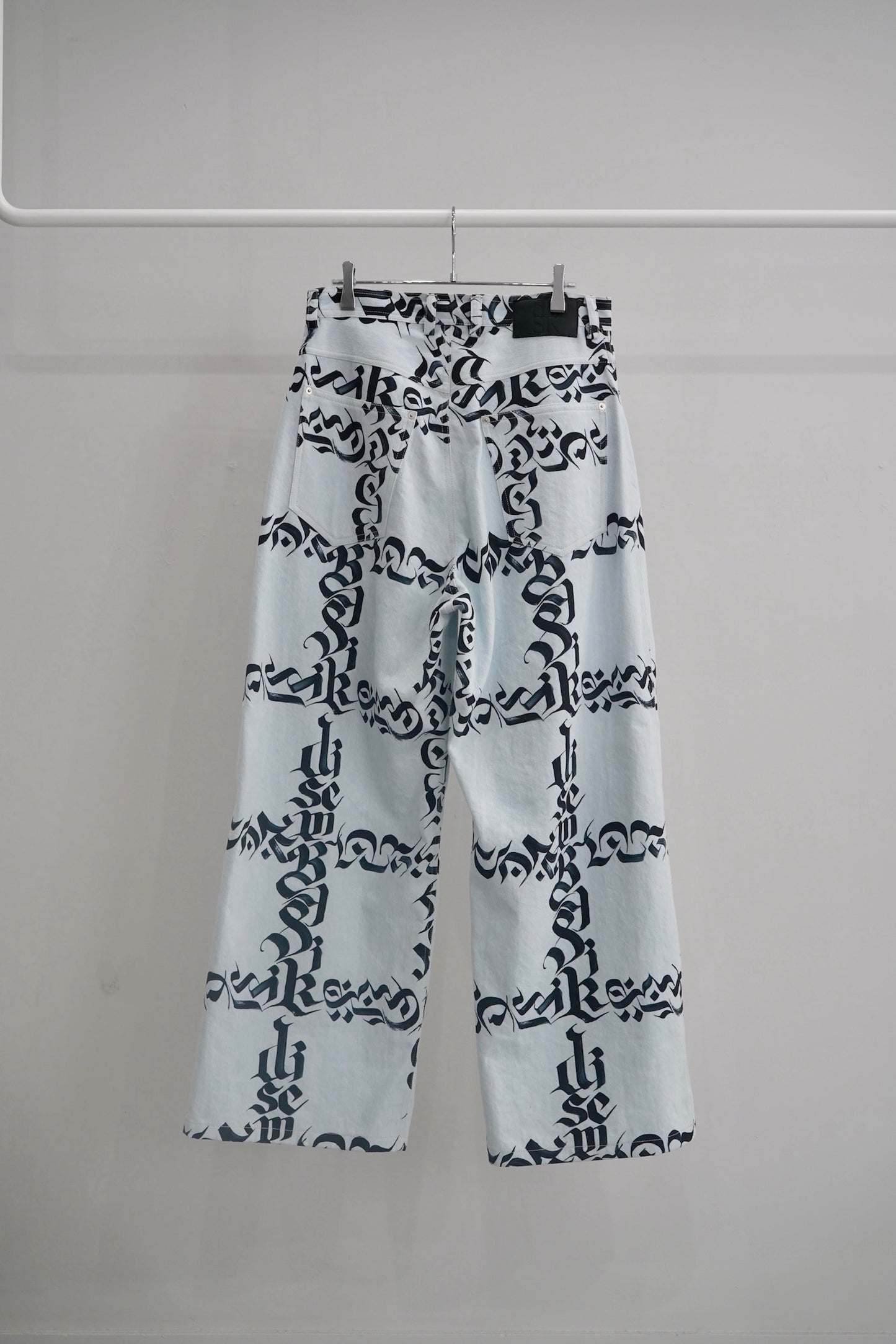 disemBySiiK Calligraphy Graphic Buggy Jeans