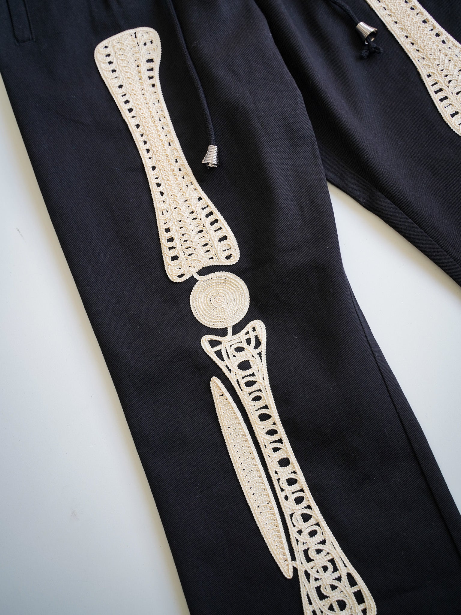 el conductorH CORD EMBROIDERED COTTON TROUSERS 'BONES コンダクター