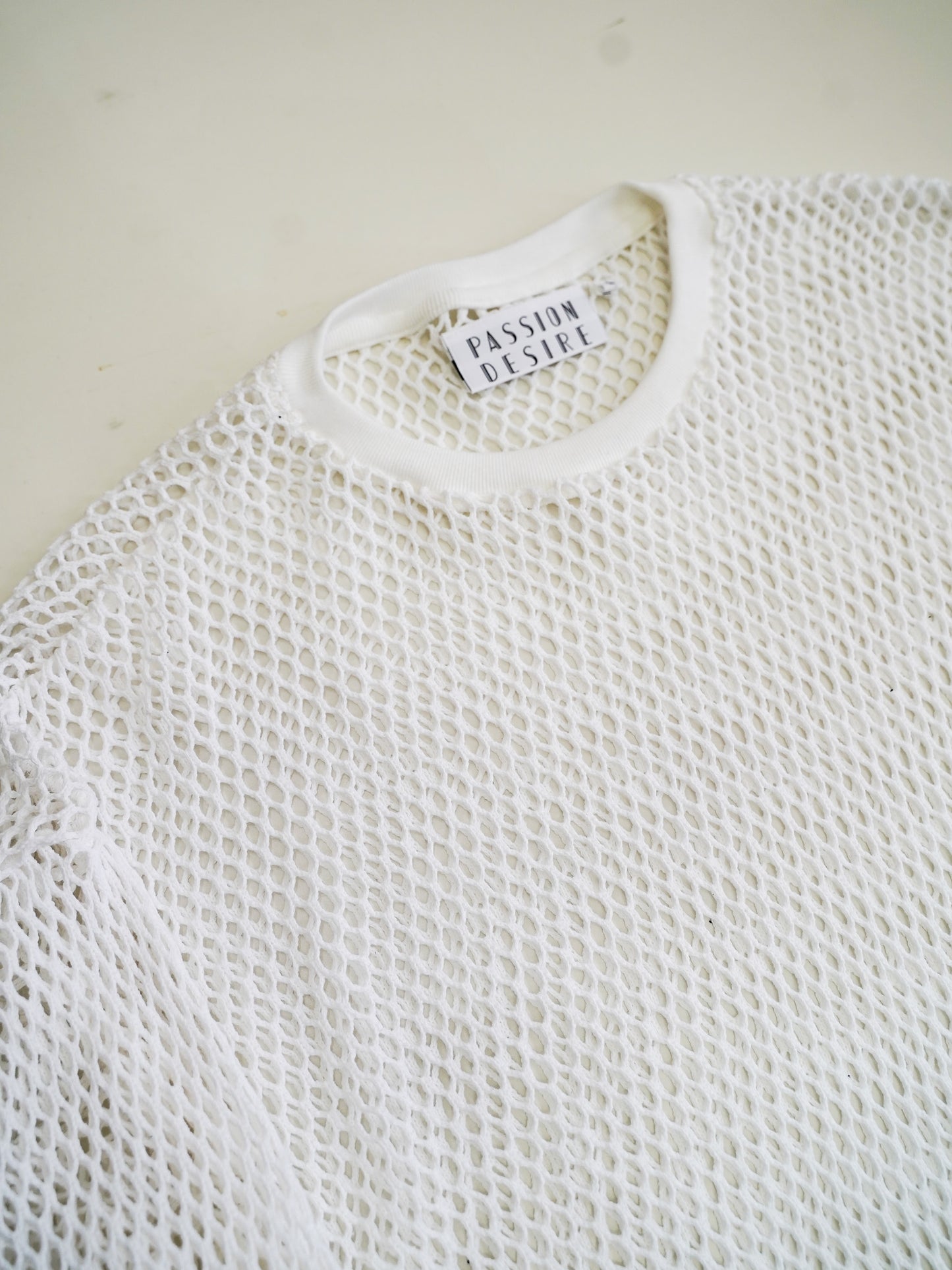 el conductorH MESH TAIL LONG SLEEVE TOP